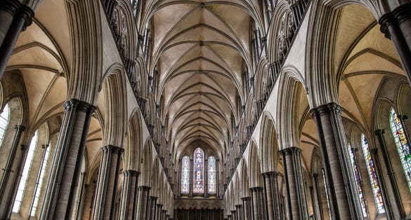 Photo of the interior of the central nave of Salisbury Cathedral, a magnificent example of the early English Gothic style. England.