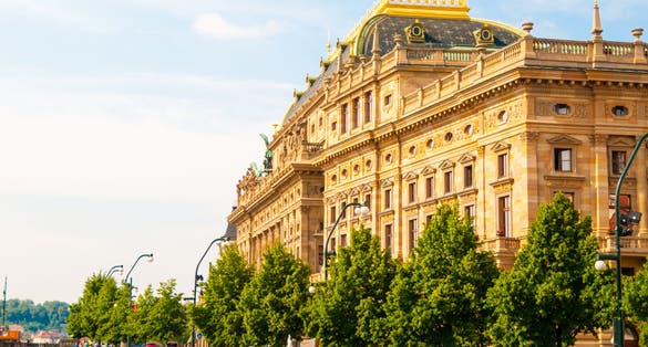 Photo of beautiful view of the Prague National Theater on a bright sunny day, Czech Republic.