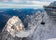 photo of cable car reaching the modern mountain station “Zugspitze“ (2962 m) on highest peak of Germany and part of the “Wetterstein“ alpine range near Garmisch-Partenkirchen in winter in Germany.