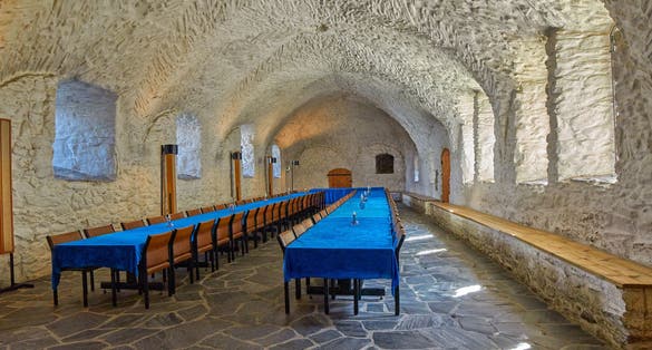 Photo of empty Royal Eatery (Canteen) in  the  Olavinlinna castle, Savonlinna, Finland.