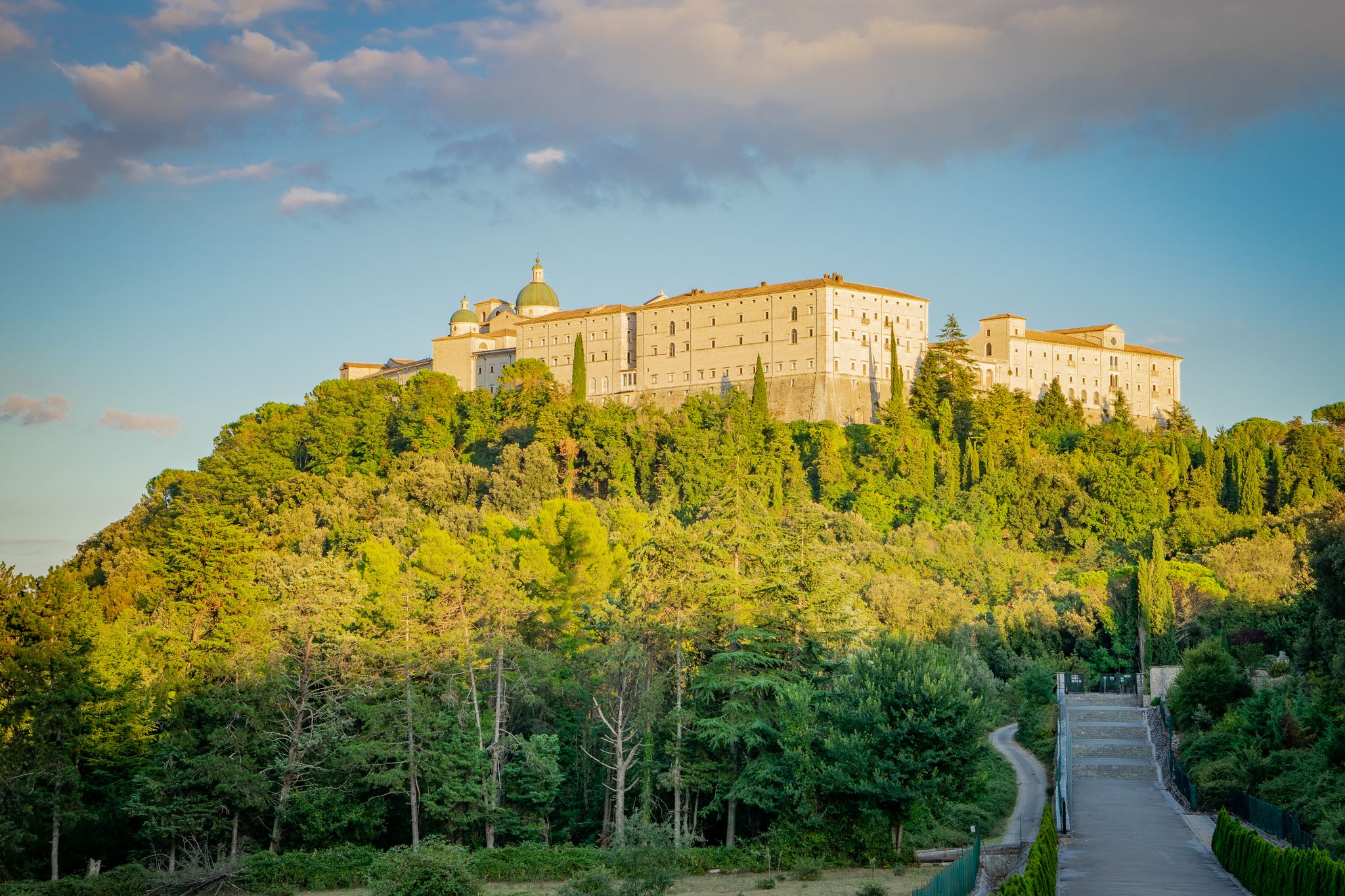 photo of Abbey of Monte Cassino, Frosinone, Italy - monastery in the evening sun.