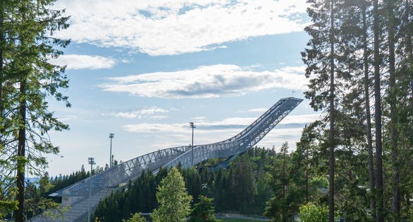 Photo of Holmenkollen ski jumping stadium and norwegian ski museum in Oslo, Norway.