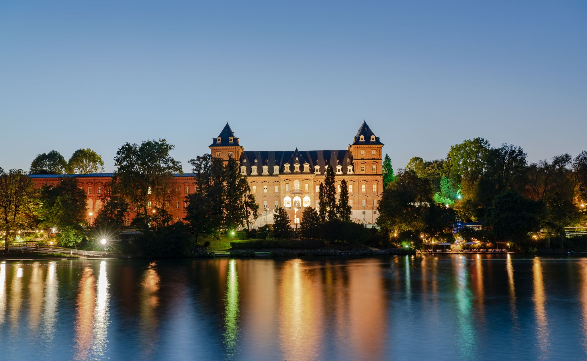 photo of Valentino Park in Turin at sunset time, The Castle .