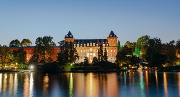 photo of Valentino Park in Turin at sunset time, The Castle .