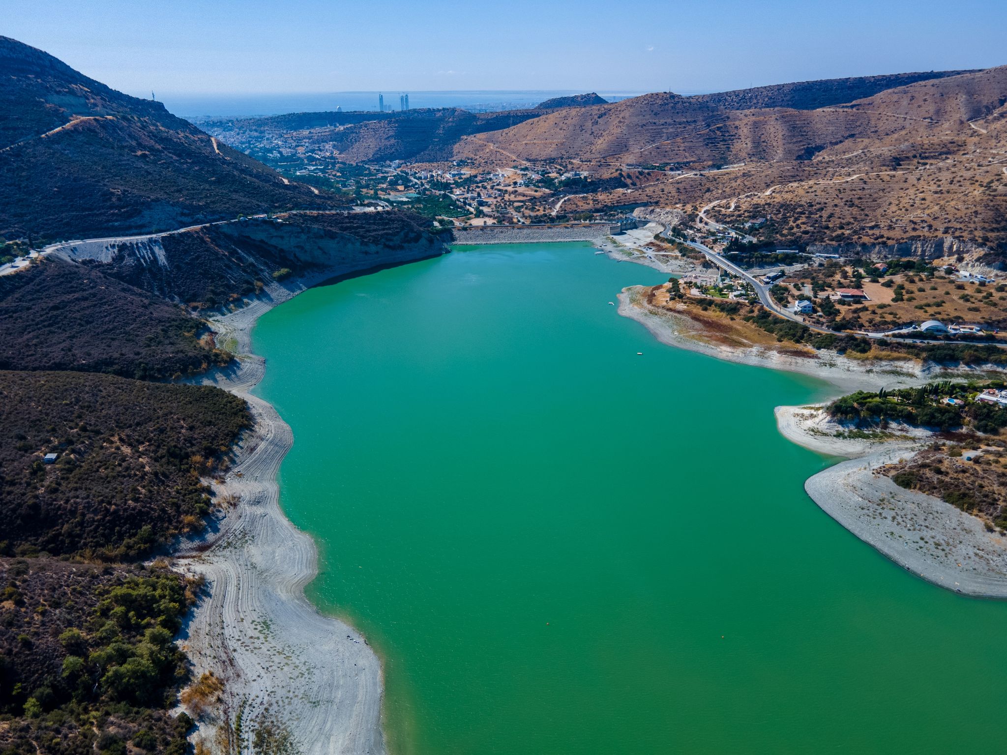 Photo of aerial view of Kouris Dam the water reservoir at the mountains, Cyprus.