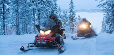 Kiruna: Guided Snowmobile Tour with Coffee Break
