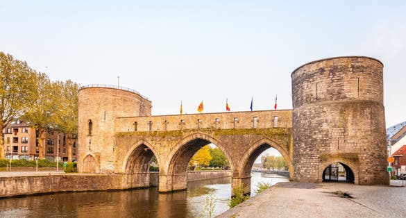 Photo of bridge of holes or Pont des Trous, the medieval bridge across the river Escaut, Tournai, Belgium.