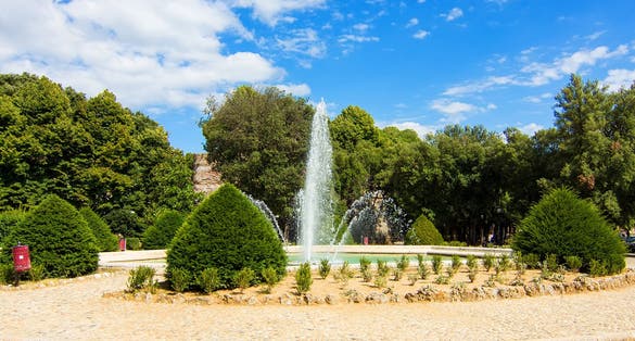 photo of San Prospero Fountain at Fortezza Medicea in Siena, old town in Tuscany, Italy. Medieval architecture of Sienna. Soft selective focus.