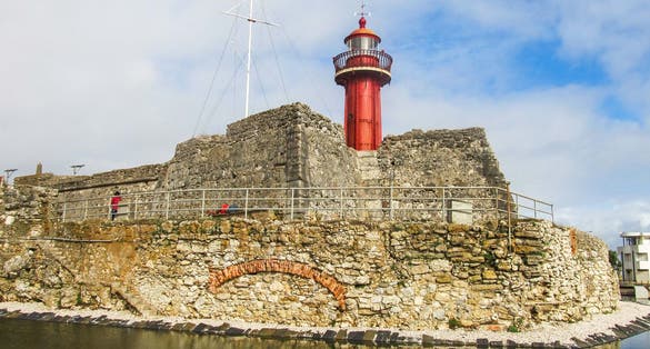 Photo of Saint Catherine's Fort and lighthouse in Figueira da Foz, Portugal.