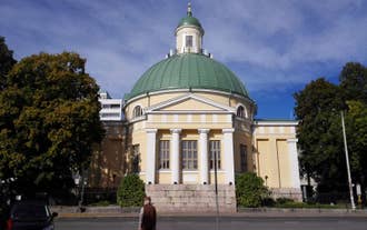 Early autumn morning panorama of the Port of Turku, Finland, with Turku Castle at background.