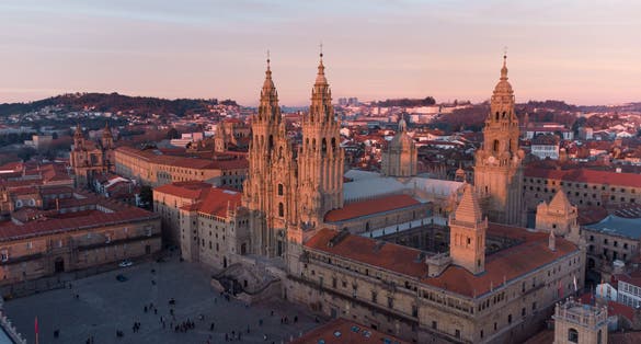 photo of  view of General view of the of Cathedral of Santiago de Compostela complex. Cathedral towers and surrounding buildings. Santiago de Compostela, Galicia, Spain.