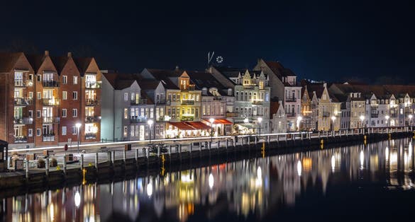 Night skyline city lights panorama of Sønderborg Havn (Sonderborg pier) before Christmas. Southern Denmark.