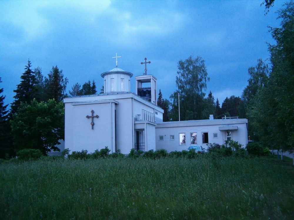 Photo of the Lintulan Pyhän Kolminaisuuden luostari at night, Palokki, Heinavesi, Finland.