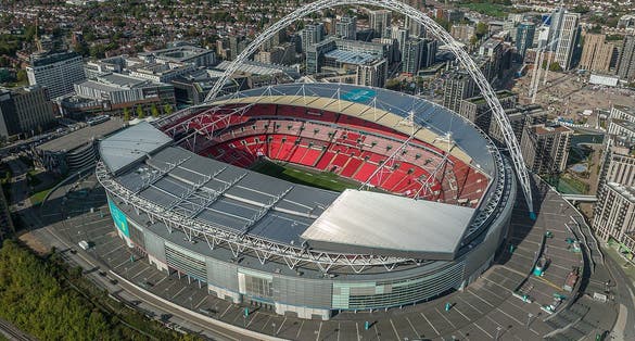 Photo of aerial view of Wembley Stadium that is a football stadium in Wembley, UK.