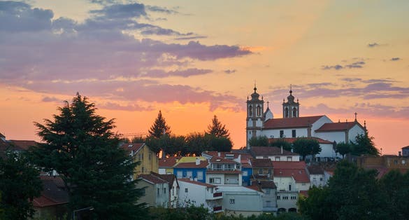 photo of the historical center of the city of Seia at sunset time, in the Serra da Estrela, Portugal.