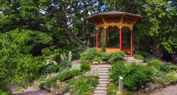 photo of wooden gazebo in DBW's Botanical Garden of Visby in Sweden.