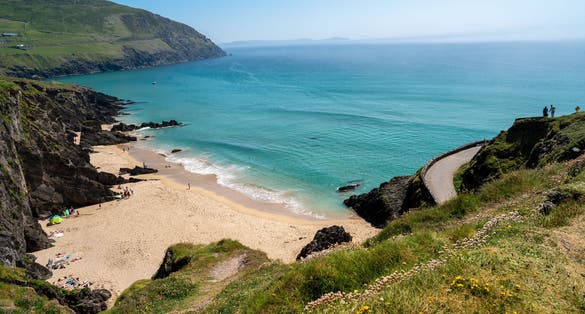 photo of Coumeenoole Beach view of sea, rocks and large cliffs near Dunquin pier via Slea Head Drive on Dingle Peninsula on the Wild Atlantic Way in Kerry on the west coast of Ireland. 