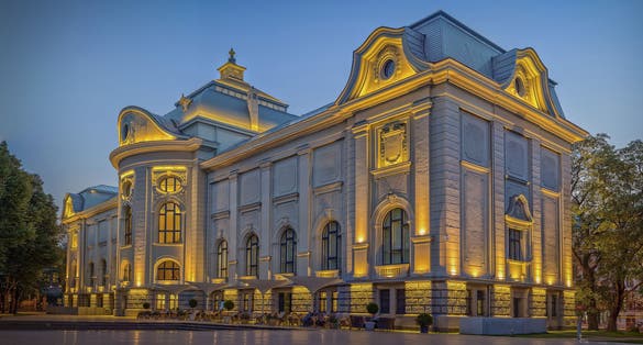 photo of Riga, Latvia - September, 2017: Latvian national museum of art. View from parc side at night.