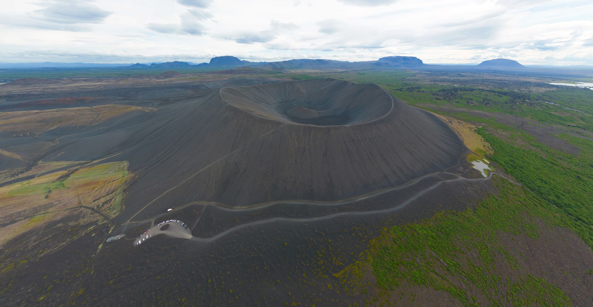 photo of view of Skútustaðagígar volcanoes in Iceland in the summer season, Reykjahlíð, Iceland.