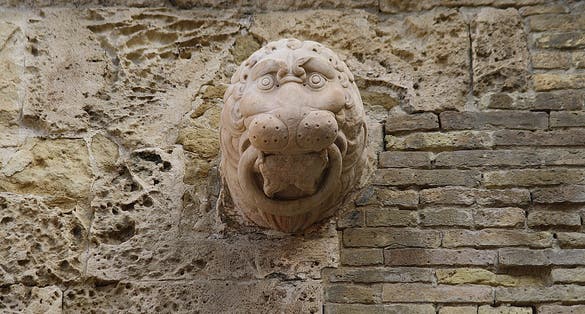 Bas-relief on the Porta dei Leoni in Cagliari, Sardinia, Italy