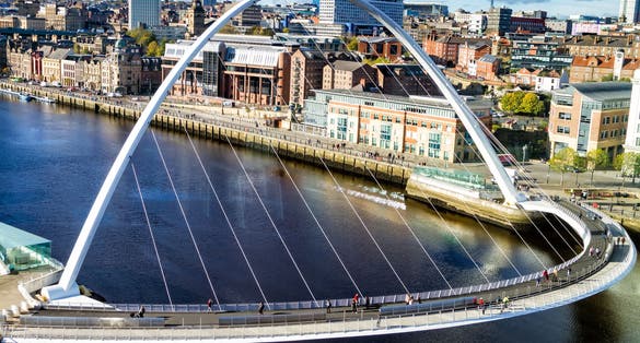 Photo of aerial view of Classic view of the Iconic Tyne Bridge spanning the River Tyne between Newcastle and Gateshead, United Kingdom.