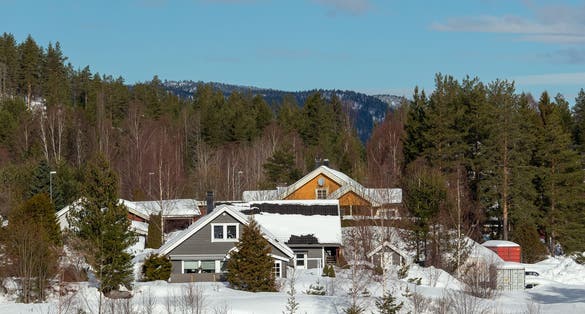 Photo of abstract landscape in the mountains, with reflection of the forest in the river at Kongsberg, Norway.