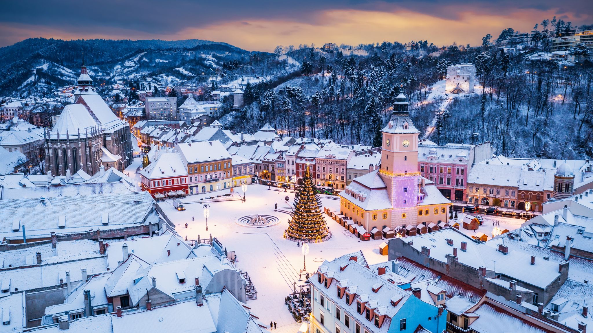 Photo of Brasov, Romania. Winter Christmas aerial view of Council Square and Christmas Tree, Transylvania landmark, Eastern Europe .