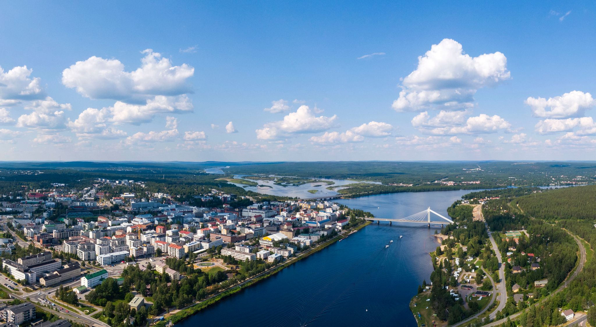 Rovaniemi Finland, panorama of the city with Kemijoki river in the back and Ounasvaara fell with the city heart at the left.