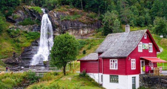 Photo of Steinsdalsfossen Waterfall, one of the most visited tourist sites in Norway, located in the village of Steine in the municipality of Kvam in Hordaland county.