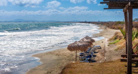 Aheloy, Bulgaria sandy beach panorama with unbrellas on the Black Sea near
