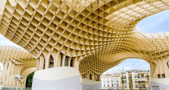Photo of Metropol Parasol wooden structure located in the old quarter of Seville, Spain.