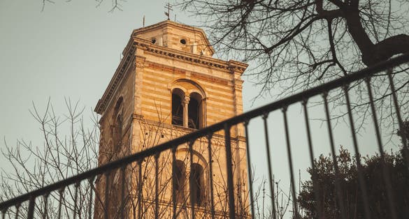 photo of view Fermo Cathedral bell tower. Ancient Roman Catholic cathedral in Fermo, region of Marche, Italy. Vintage toned photo, retro stylized filter effect,Fermo italy.