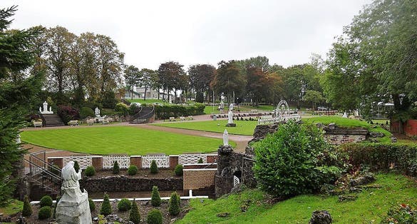 Photo of Outdoor Christian Altar in Carfin Lourdes Grotto, Scotland .