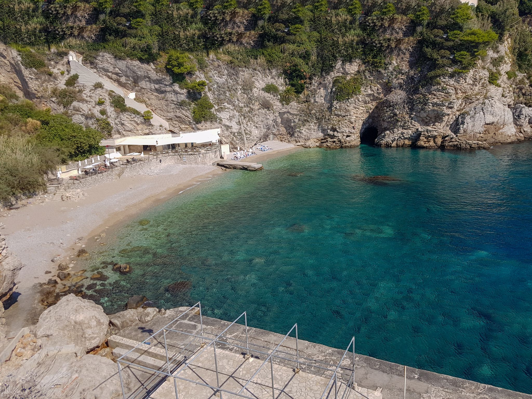 Photo of aerial view of the public Bellevue beach in Dubrovnik, Croatia.