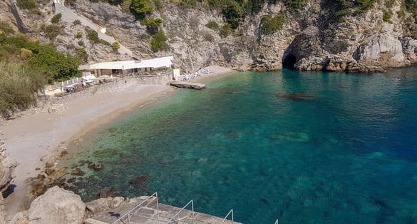 Photo of aerial view of the public Bellevue beach in Dubrovnik, Croatia.