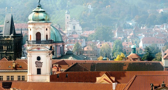 Photo of roofs of Clementinum jesuit college and Astronomical Tower, Prague, Czech republic.