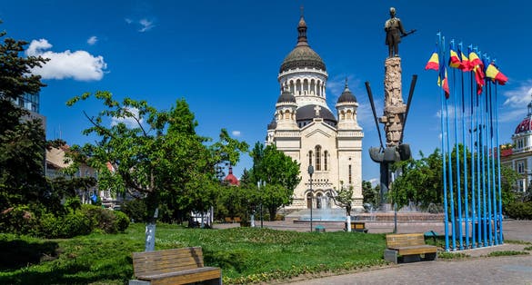 Avram Iancu Square,Cluj-Napoca,Romania with the statue of Avram Iancu(the leader of romanian revolution from Transylvania 1848-1849) and the Orthodox Cathedral of Cluj, Alba,Crisana and Maramures