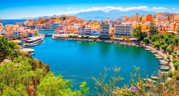 Photo of aerial view of the port in Agios Nikolaos, famous travel destination of Crete, Greece.