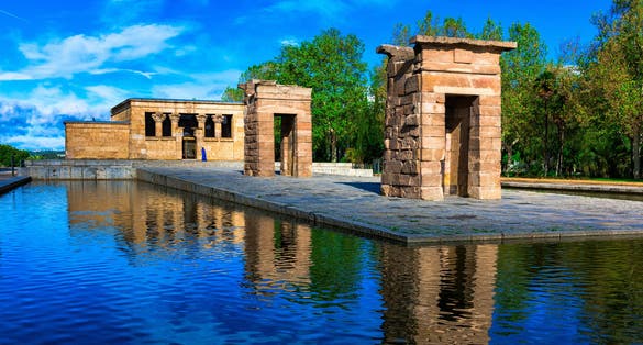 Photo of The Temple of Debod (Templo de Debod) is an ancient Egyptian temple in Madrid, Spain. The temple was rebuilt in one of Madrid parks, the Parque del Oeste, near the Royal Palace of Madrid .
