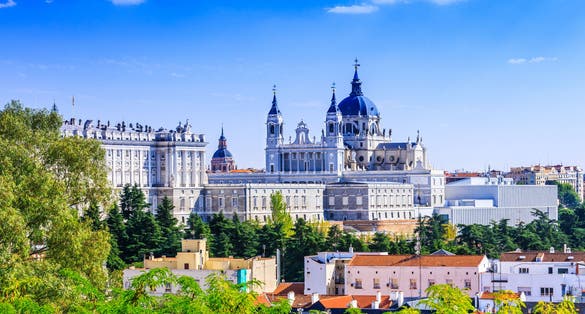 Photo of Madrid, Spain. Santa Maria la Real de La Almudena Cathedral and the Royal Palace.
