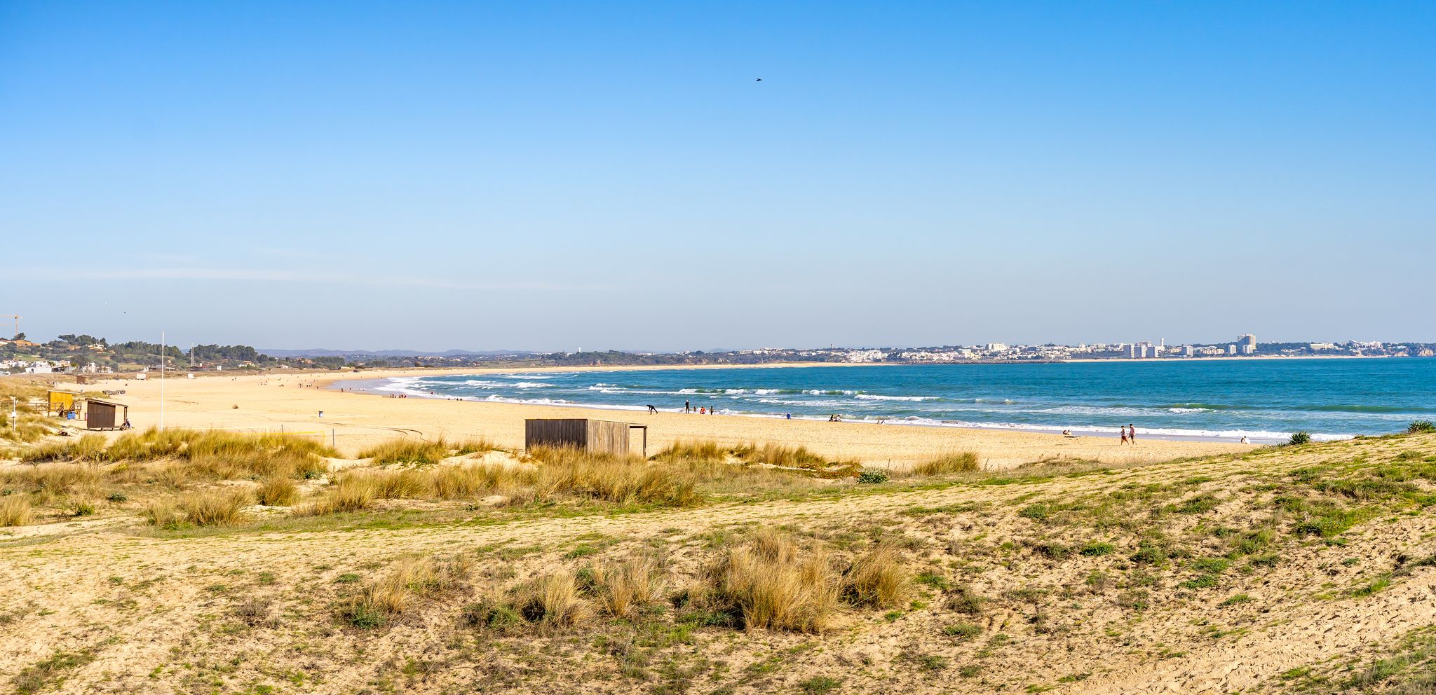 Tourism at Meia Praia in Lagos in the Algarve Portugal.