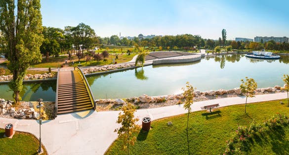 Panoramic view of Drumul Taberei Park, also known as Moghioros Park, in Bucharest Romania, in a sunny autumn day.