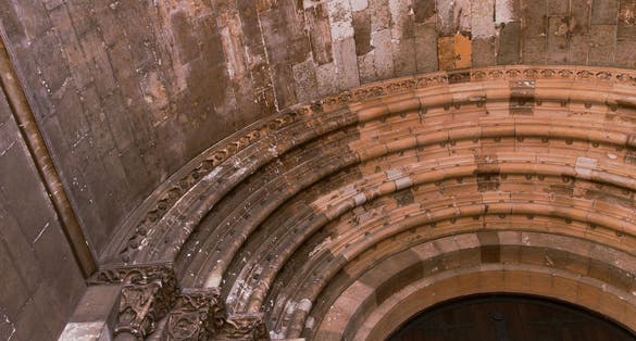 The Gothic arch entrance of the Se Cathedral Igreja de São Roque Roman Catholic church in Lisbon, Portugal.