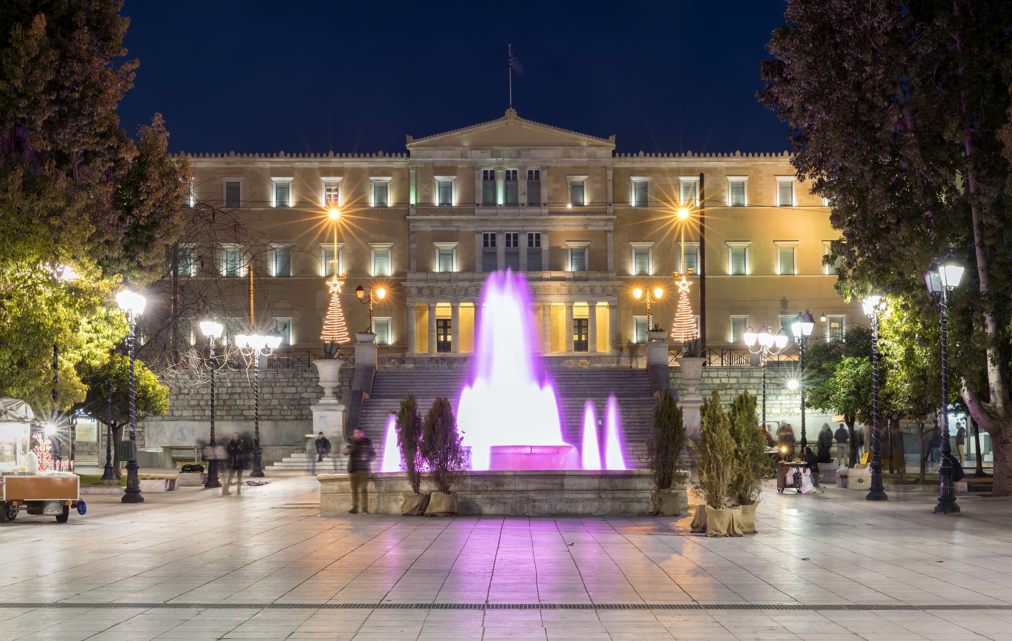 photo of view of Syntagma Square with Parliament building in Athens, Greece, by night, Athens, Greece.