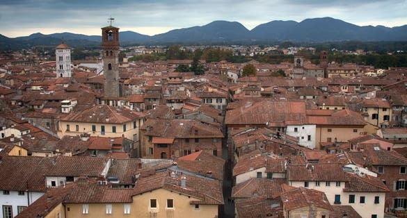 photo of City view from Guinigi tower, Lucca in Tuscany, Italy .