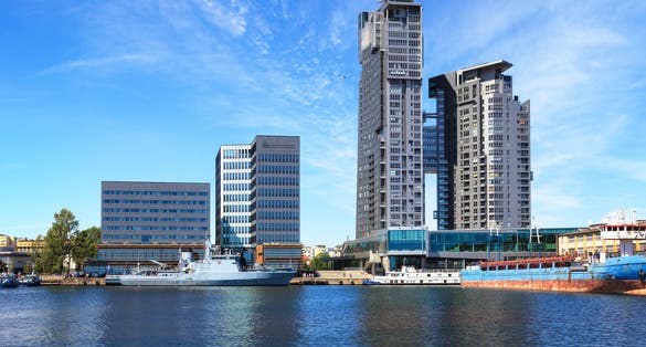 Photo of Shhips moored at the wharf in the port of Gdynia, Poland.