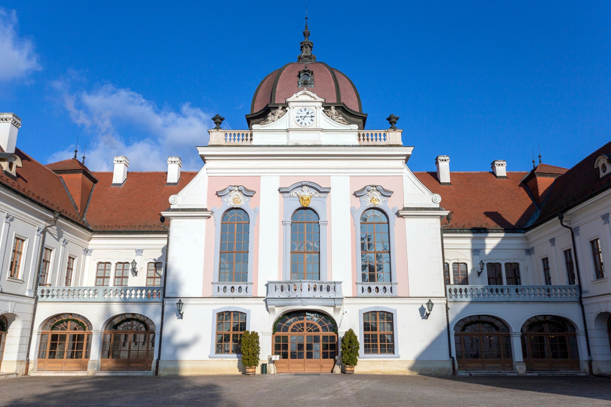 photo of view of The Royal Palace of Godollo in Hungary on a winter day, Gödöllő, Hungary.