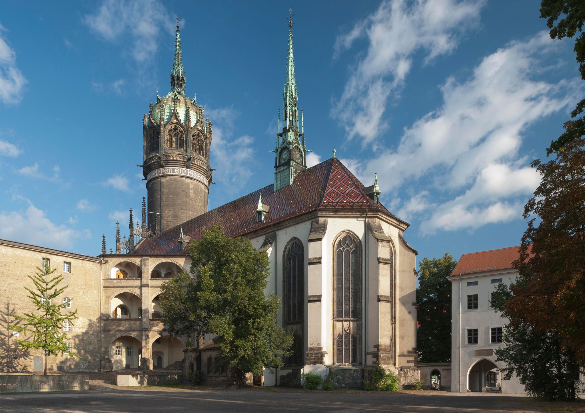 Photo of Lutheran Castle Church, or Church of the Reformation, where Martin Luther posted his theses, Lutherstadt Wittenberg, Germany.