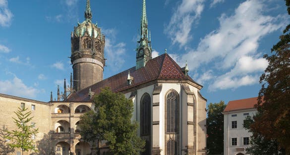 Photo of Lutheran Castle Church, or Church of the Reformation, where Martin Luther posted his theses, Lutherstadt Wittenberg, Germany.