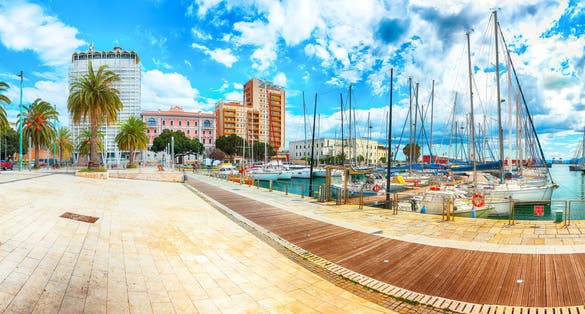 Splendid spring Cityscape with marina and Yachts and boats in town Cagliari.